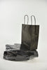 Draagtas matzwart kraft 18+8x22cm a 50 stuks gedraaid handv.
