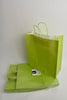 Draagtas Lime kraft 35+14x40cm a 50 stuks gedraaid handv.