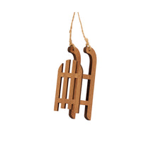 pm. 4 wooden sledges/hanging brown 9 cm