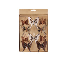 w/b. 10 butterflies/clip 4 assorted brown assorted