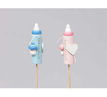 cb. 8 wooden baby bottles/stick pink/blue 6 cm