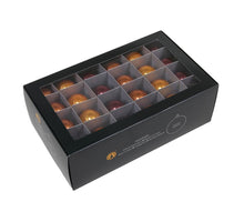 w/b. 48 glassballs/cap caramel brown 40 mm