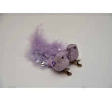 Bird with Feathers and Cliff Heather