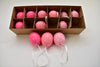 Box of 12 chicken eggs decorated with ribbon in pink mix