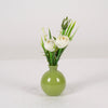 Ranunculus in green glass vase H22cm white