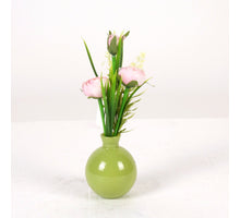 Ranunculus in green glass vase H22cm pink