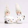 BOY AND GIRL ON SNOWBALL GREEN 25 CM ASSORTED POTTERY - PER PIECE