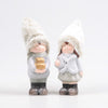 BOY AND GIRL STANDING GREEN 6.5X17 CM ASSORTED EARTHENWARE - PER PIECE
