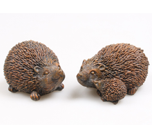 EGEL M/KIND BRONZE-ANTIEK 2 ASSORTIE 10X7X8 CM POLYRESIN