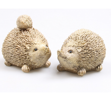 EGEL M/KIND GOUD 2 ASSORTIE 10X7X8 CM POLYRESIN