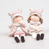NOA & MILAN WITH DANGLING LEGS PINK POLYRESIN 9X6.5X11.5 CM - PER STUK