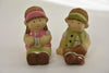 Child with sitting 2 assorted 7x6x8cm ceramic Green and Pink